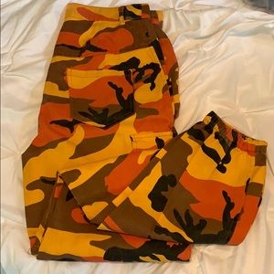 Orange camo cargo pants with cinched ankle